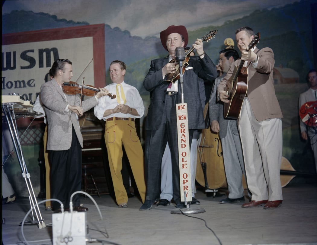 Bill Monroe on the Grand Ole Opry, Nashville, c.1958.
Credit: Les Leverett Collection