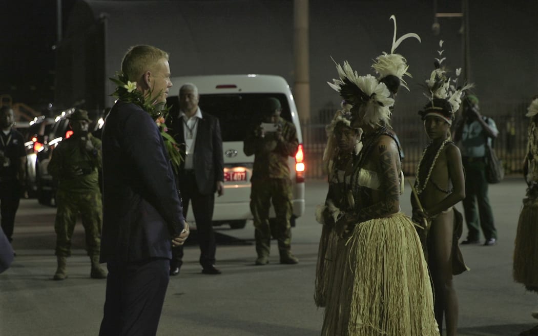 Chris Hipkins being welcomed into Port Moresby