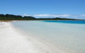 Lake Taharoa is renowned for its clear water and soft white sand.