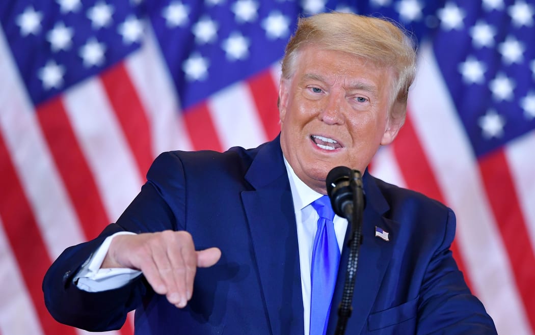 US President Donald Trump speaks during election night in the East Room of the White House in Washington, DC, early on November 4, 2020. (Photo by MANDEL NGAN / AFP)
