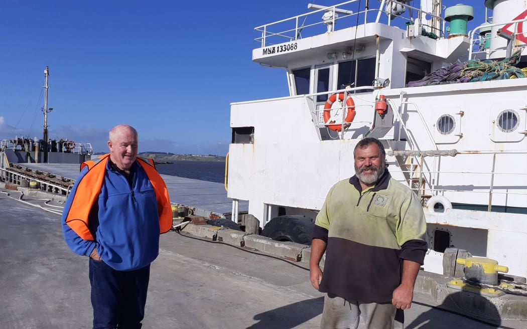 Coastal Bulk Shipping general manager Doug Smith, left, and Whanganui Port worker Greg Robinson at Wharf No. 1.