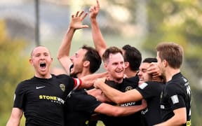 Team Wellington Celebrate a goal.