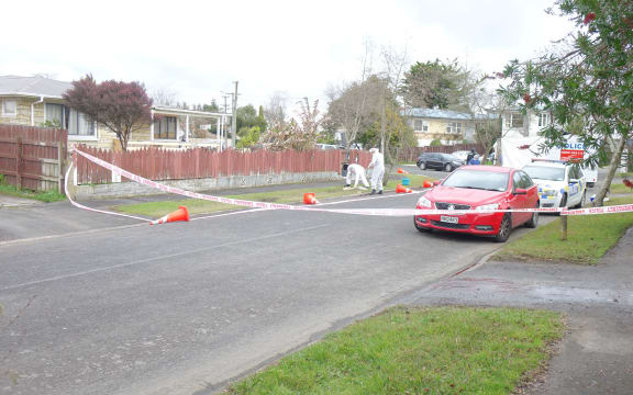 Police outside the Matthews Crescent home in Melville, Hamilton.