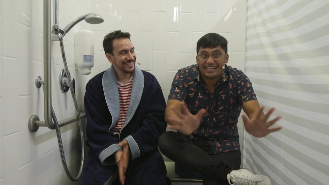 Comedian David Correos with host James Nokise.