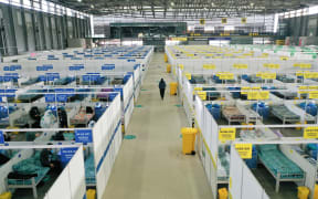 The quarantine zone at the Shanghai New International Expo Center is seen on 1 April, 2022. Shanghai's largest temporary quarantine venue for mild cases and asymptomatic carriers has a capacity of over 15,000 beds.