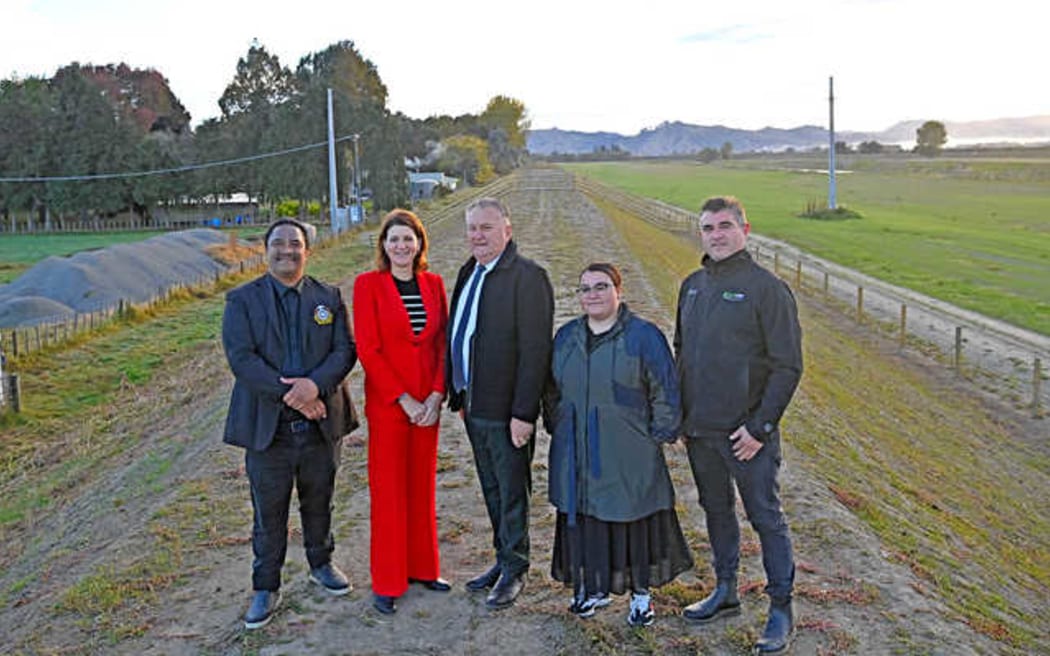 A dawn ceremony was held at the Western side of the stopbanks along the Waipaoa River yesterday morning. From left are Morehu Pewhairangi from Te Aitanga a Mahaki iwi, Mayor Rehette Stoltz, Minister Shane Jones, Rongowhakaata Iwi Trust chair Staci Hare and Earthwork Solutions managing director Matt Mead. Picture by Paul Rickard. (LDR single use only).