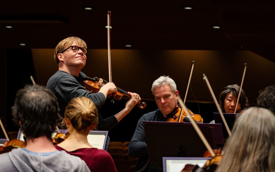 Violinist Pekka Kuusisto rehearses with the New Zealand Symphony Orchestra.