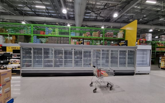 A shortage of supplies is evident, with empty shelves at Pak'nSave in Napier. Queues to get in stretched around the street, with the supermarket limiting the number of people inside at a time.
