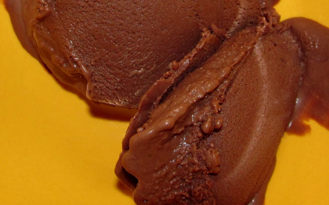 Scoop of chocolate ice cream.