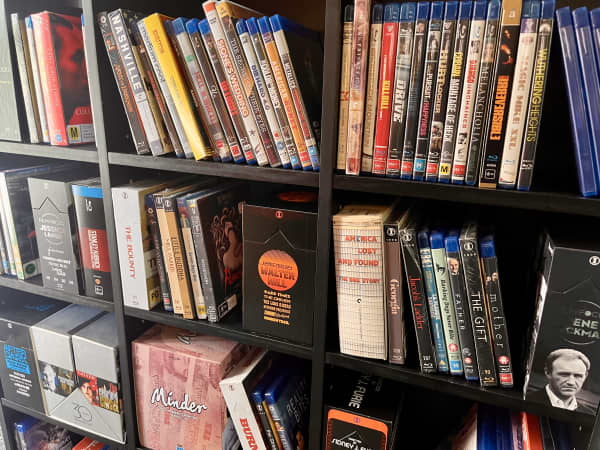 DVDs and Blu-rays on a shelving unit