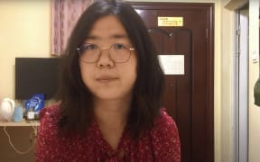 Screengrab taken on December 28, 2020 from an undated video showing former Chinese lawyer and citizen journalist Zhang Zhan.