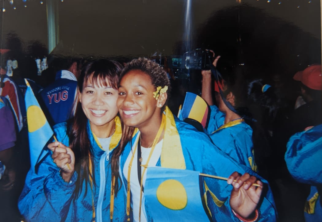Nicole Hayes with Palau's swim coach Miko during the games.