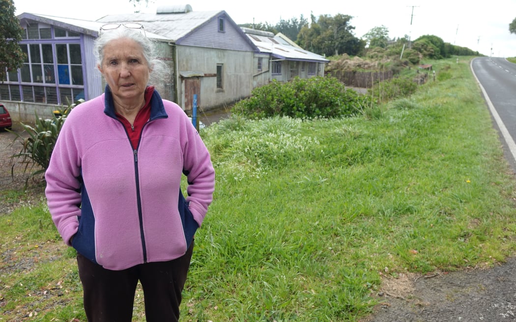 Fiona Clark outside the converted dairy factory on Inland North Rd where she lives.
