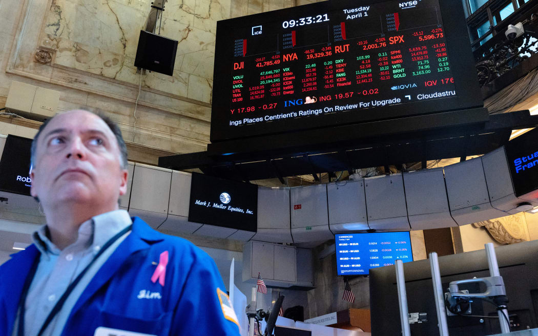 NEW YORK, NEW YORK - APRIL 01: Traders work on the floor of the New York Stock Exchange during morning trading on April 01, 2025 in New York City. Stocks opened up low as the market reacts to tomorrow’s expected proposal by U.S. President Donald Trump for a round of new tariffs on most imports to the United States, which the president has dubbed “Liberation Day.” China, Japan, and South Korea have agreed to respond to U.S. tariffs jointly.   Michael M. Santiago/Getty Images/AFP (Photo by Michael M. Santiago / GETTY IMAGES NORTH AMERICA / Getty Images via AFP)