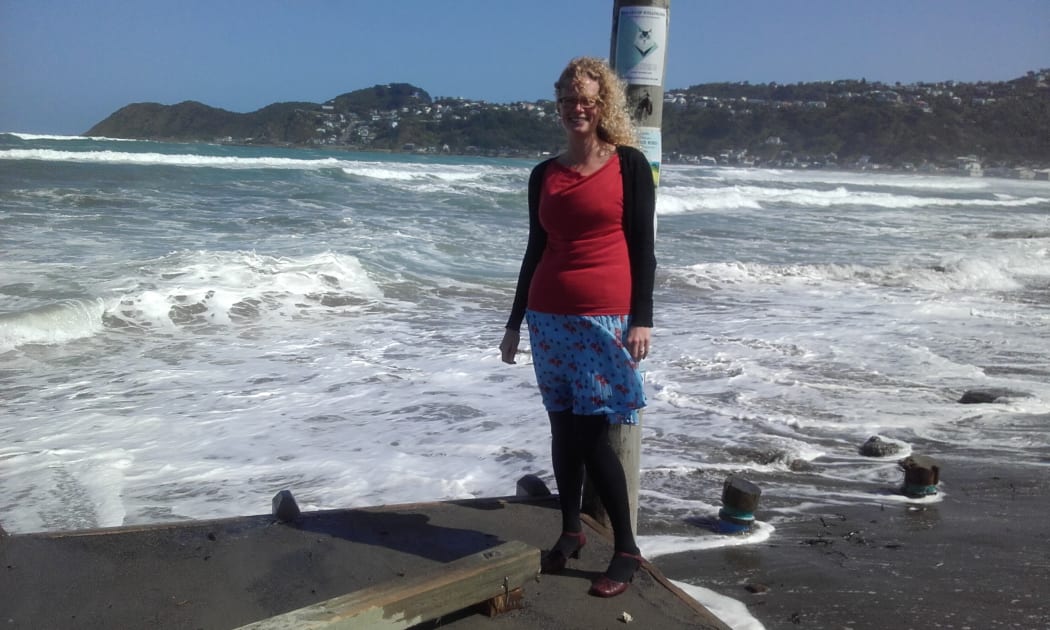 Wellington City Council urban ecology team leader Myfanwy Emeny at the Lyall Bay beach, where waves come right up to a car parking area.
