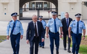 Alongside police, Australian Prime Minister Anthony Albanese has laid flowers at the scene of a deadly terrorist attack at Sydney's Bondi Beach which occurred on 14 December 2025.