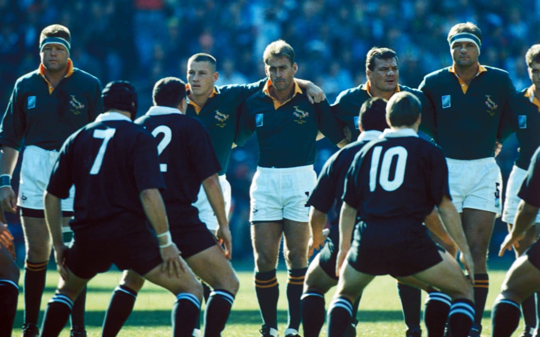 Springboks players face the Haka.