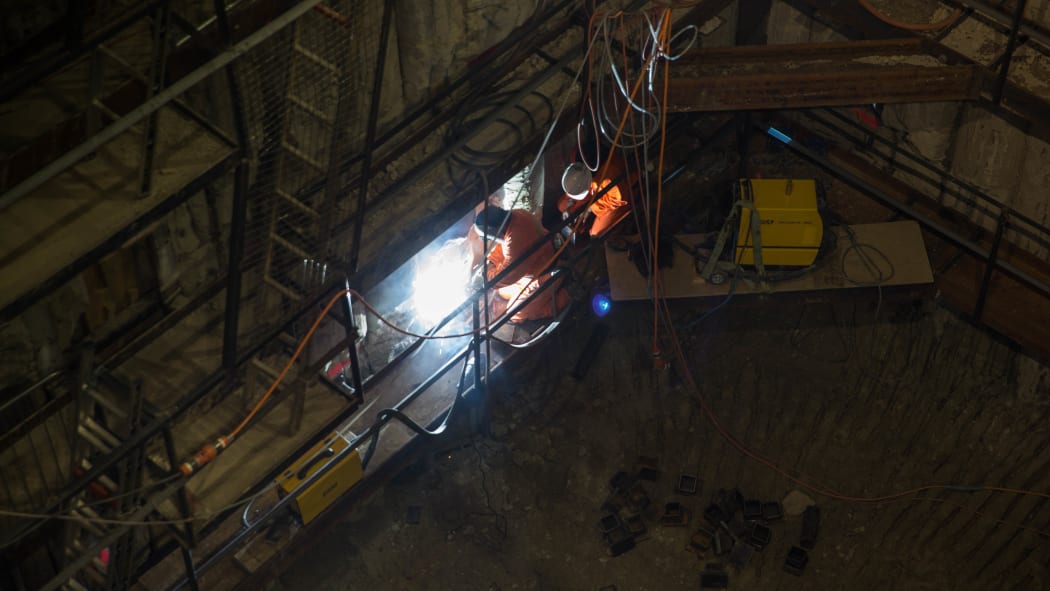 A welder working on the City Rail Link project