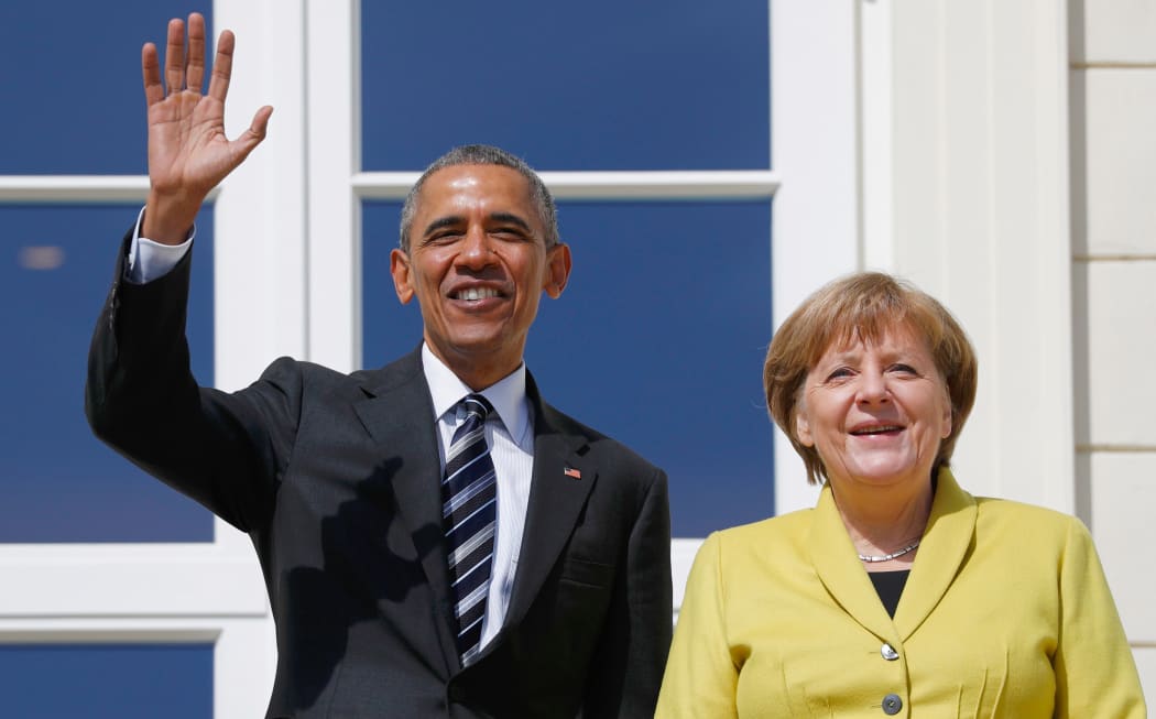 US President Barack Obama is in Germany where he is holding meetings with German Chancellor Angela Merkel.