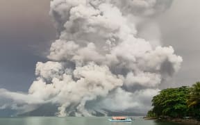 An eruption from Mount Ruang volcano is seen from Tagulandang island in Sitaro, North Sulawesi, on April 30, 2024. (Photo by AFP)