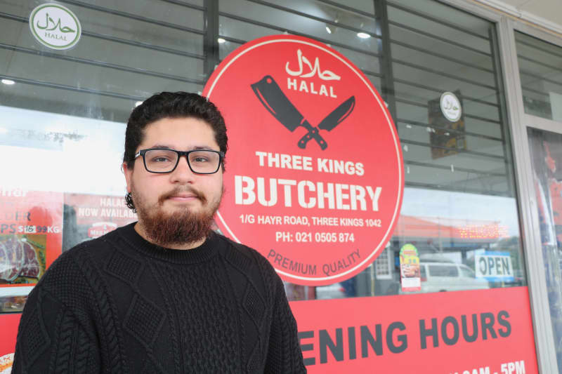 Mobile software developer Mohamed Soliman standing outside the halal butchery, Three Kings, in Auckland.