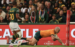 Australia's wing Dylan Pietsch scores a try during the Rugby Championship first round Test match between South Africa and Australia at Ellis Park Stadium in Johannesburg, 2025.