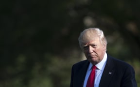 US President Donald Trump after arriving on Marine One on the South Lawn of the White House in Washington, DC, April 28, 2017,