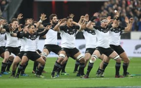 The All Blacks perform the Haka in a Test against France in Paris.