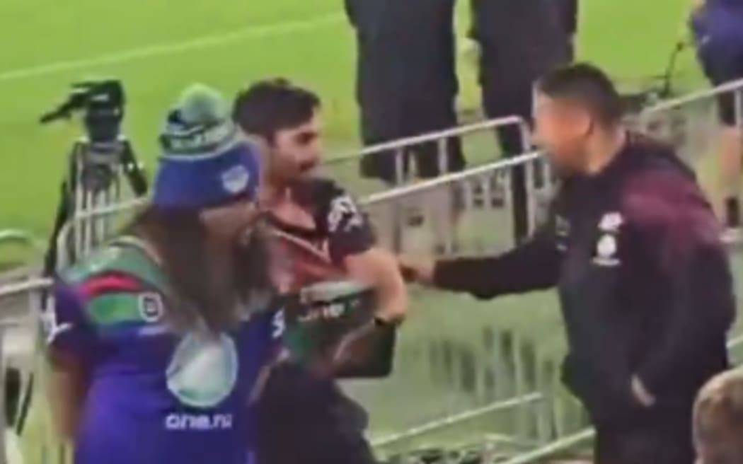 Chan Kum Tong grabbed one of the fans by their jersey