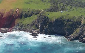 A rescue helicopter crew carried out two winch operations to retrieve two men (one with a spinal injury and one deceased) from this area.