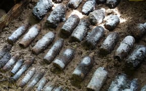 A collection of small munitions including American and Japanese grenades found in Peleliu are housed at the NPA storage site, Nov. 26, 2024.