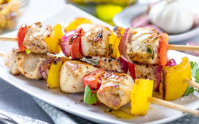 Grilled skewers of vegetables and meat on the Table