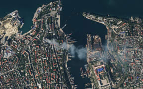 This handout satellite image released on September 23, 2023 by Planet Labs PBC shows an aerial view of the city of Sevastopol after a missile attack struck the headquarters of Moscow's Black Sea fleet in annexed Crimea on September 22, 2023, sparking a huge fire and leaving at least one Russian serviceman missing. The strike on the symbolic heart of Russia's Black Sea fleet marks a major blow for Moscow, which has suffered a string of attacks on the strategically important port in recent months. (Photo by Handout / Planet Labs PBC / AFP) / RESTRICTED TO EDITORIAL USE - MANDATORY CREDIT "AFP PHOTO / PLANET LABS PBC" - NO MARKETING - NO ADVERTISING CAMPAIGNS - DISTRIBUTED AS A SERVICE TO CLIENTS
RESTRICTED TO EDITORIAL USE - MANDATORY CREDIT "AFP PHOTO / PLANET LABS PBC" - NO MARKETING - NO ADVERTISING CAMPAIGNS - DISTRIBUTED AS A SERVICE TO CLIENTS /