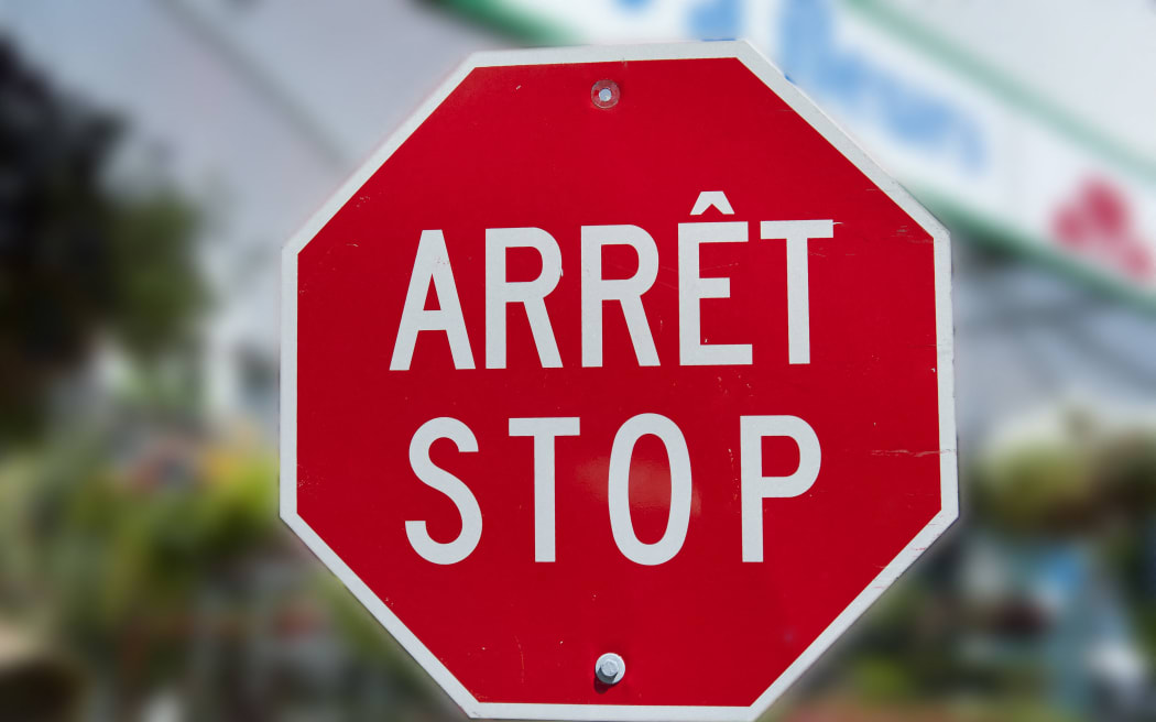 Canada, Province of Quebec. Bilingual road sign (Photo by Daniel THIERRY / Photononstop / Photononstop via AFP)