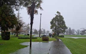 Drain flooding Victoria Square near the Emergency Operations Centre in Westport.