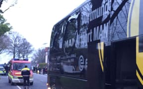 The damaged Borussia Dortmund bus.