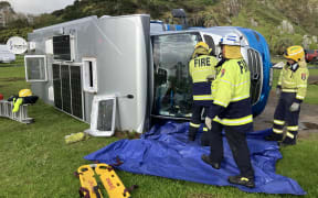 Firefighters from the Kerikeri and Kāeo brigades cut through the campervan’s windscreen to reach the injured occupant.