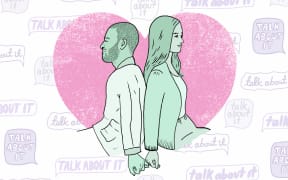 An illustration of a couple sitting with their backs to each other, but linking their pinkies together. Speech bubbles in the background repeat in different fonts with the words "talk about it".