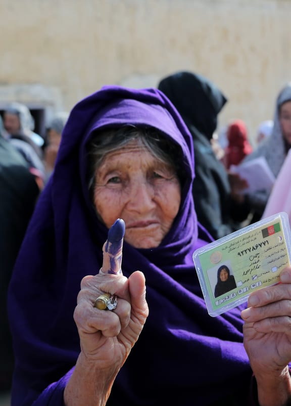Voters' fingers were inked after casting a ballot.
