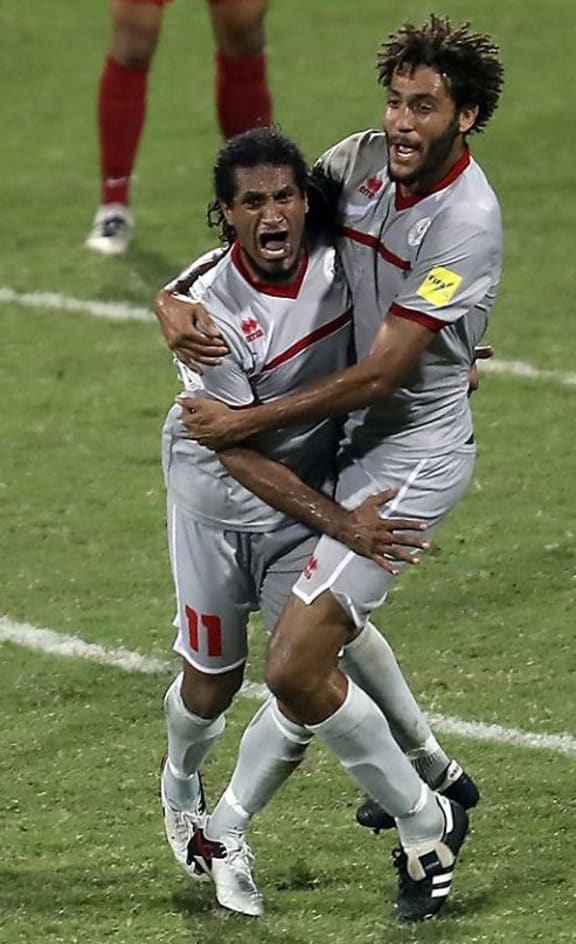 New Caledonia celebrate Bertrand Kai's (11) goal against Tahiti.