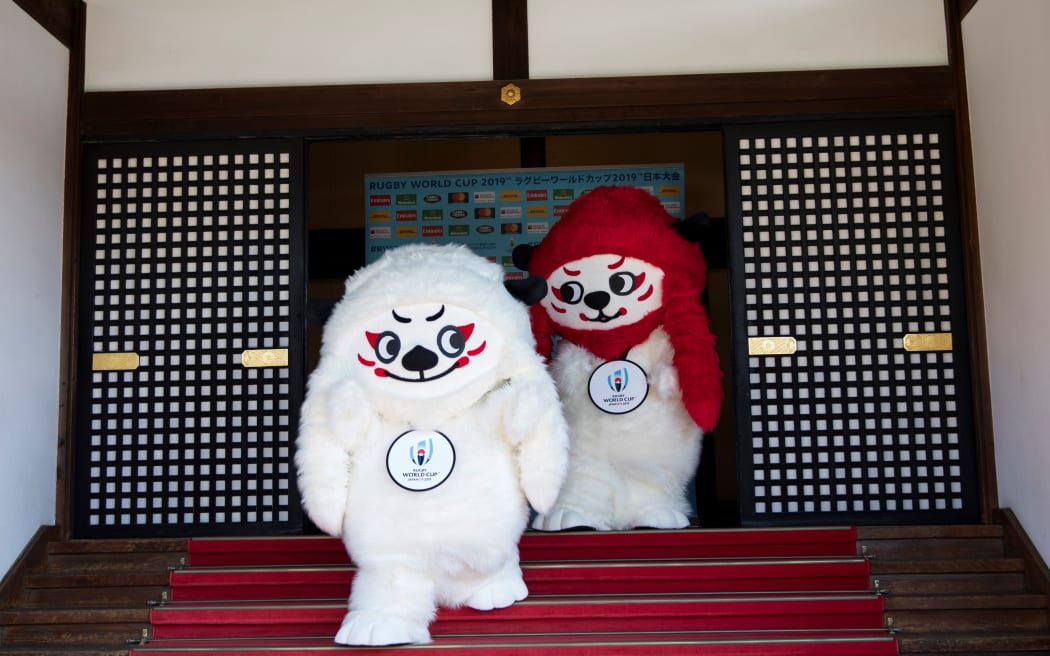 Mascots Ren (L) and G (R) are pictured during a photo session to unveil the official mascots of the Rugby World Cup 2019 in Tokyo