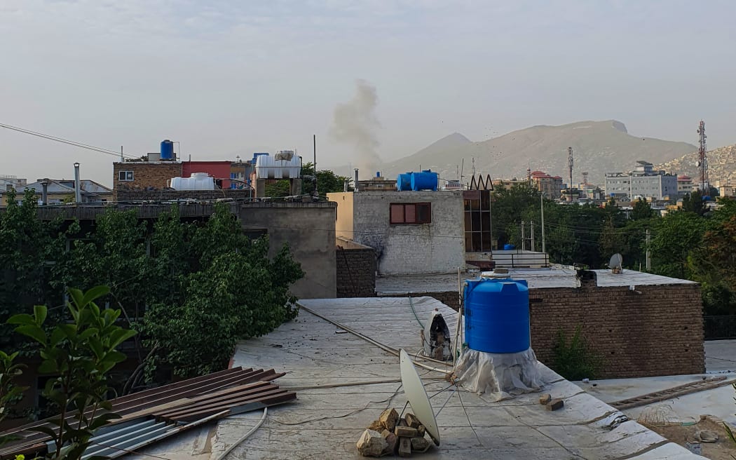 In this photograph taken on July 31, 2022, smoke rises from a house following a US drone strike in the Sherpur area of Kabul. - US President Joe Biden announced on August 1 that Al-Qaeda chief Ayman al-Zawahiri had been killed by a drone strike in the Afghan capital. (Photo by AFP)