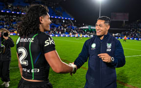 Dallin Watene-Zelezniak of the Warriors and Roger Tuivasa-Sheck shake hands.
One NZ Warriors v Dolphins, Indigenous round 12 of the Telstra NRL Premiership at Go Media Stadium, Mt Smart, Auckland, New Zealand on Sunday 26 May 2024. © Photo: Andrew Cornaga / Photosport