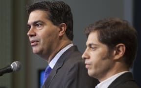 Jorge Capitanich (left) and Economy Minister Axel Kicillof.