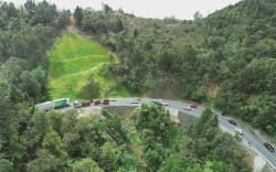 An aerial view of temporary repairs to underslips at Waterfall Corner, on the south side of the Brynderwyns, which Waka Kotahi says urgently need a permanent fix.