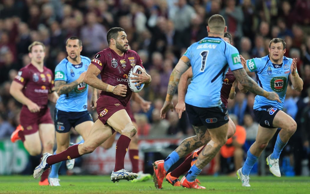 Greg Inglis on the charge for the Maroons