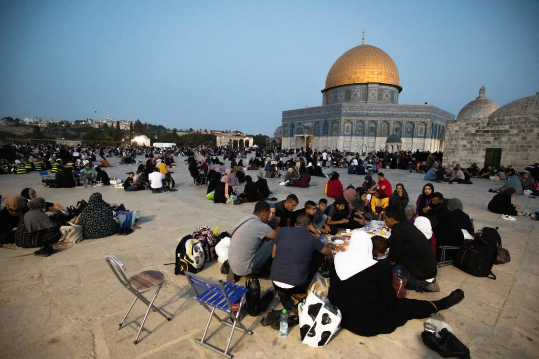 Palestinians break their fast at Al-Aqsa Mosque during Laylat al-Qadr, one of their holiest nights, on 9 May.