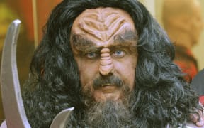 A participant dressed as a "Klingon" warrior from the cult TV series Star Trek poses for a photograph during the "Fedcon XVII" Sci-Fi and Star Trek convention in Bonn, on April 18, 2008.  The Fedcon is Europe's largest Sci-Fi fair and will last till April 20. AFP PHOTO DDP/HENNING KAISER     GERMANY OUT (Photo by HENNING KAISER / DDP / ddp images via AFP)