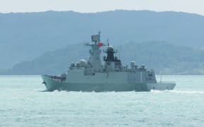 A handout photo taken on February 11, 2025 and released on February 13, 2025 by the Australian Defence Force shows China's People’s Liberation Army-Navy Jiangkai-class frigate Hengyang, part of a task group operating to the north east of Australia. (Photo by Handout / AUSTRALIAN DEFENCE / AFP) / ----EDITORS NOTE ----RESTRICTED TO EDITORIAL USE MANDATORY CREDIT " AFP PHOTO / AUSTRALIAN DEFENCE" NO MARKETING NO ADVERTISING CAMPAIGNS - DISTRIBUTED AS A SERVICE TO CLIENTS