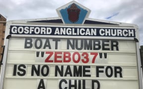 One of the controversial displays on Archdeacon Rod Bower's Gosford Anglican Church sign.